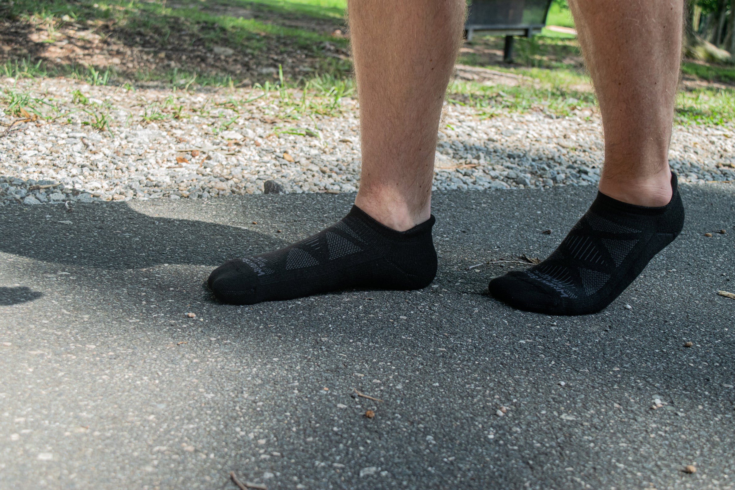 Run Luxe socks on a road.