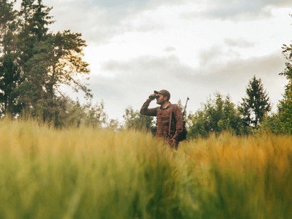 a man hunting in a field