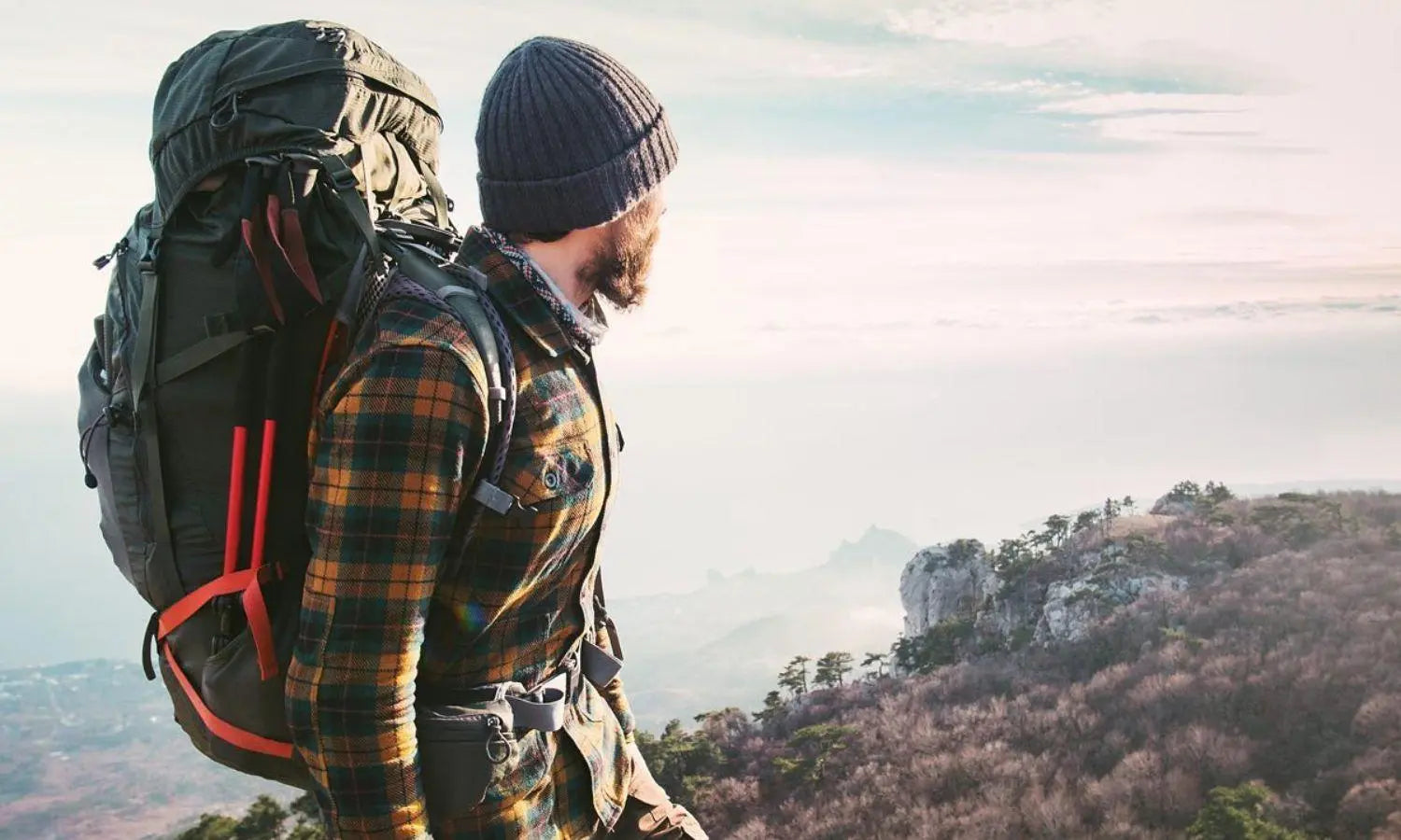 A man hiking in the mountains. 