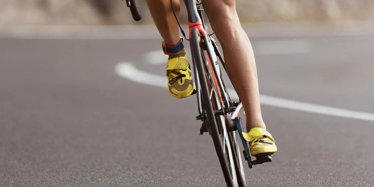 A person riding a bicycle on a road.